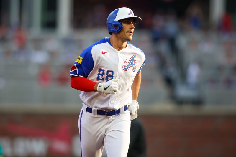 May 20, 2023; Atlanta, Georgia, USA; Atlanta Braves first baseman Matt Olson (28) runs after a home run against the Seattle Mariners in the first inning at Truist Park. Mandatory Credit: Brett Davis-USA TODAY Sports
