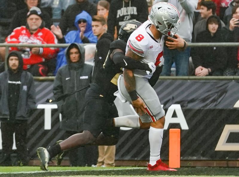 Oct 14, 2023; West Lafayette, Indiana, USA;  Ohio State Buckeyes tight end Cade Stover (8) runs in a for a touchdown against Purdue Boilermakers defensive back Sanoussi Kane (21) during the second half at Ross-Ade Stadium. Mandatory Credit: Robert Goddin-USA TODAY Sports