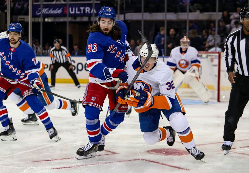 Sep 24, 2024; New York, New York, USA; New York Rangers center Mika Zibanejad (93) and New York Islanders center Kyle McLean (32) battle after a face-off during the first period at Madison Square Garden. Mandatory Credit: Danny Wild-Imagn Images