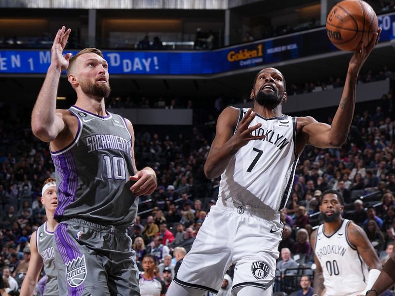 SACRAMENTO, CA - NOVEMBER 15: Kevin Durant #7 of the Brooklyn Nets shoots the ball during the game against the Sacramento Kings on November 15, 2022 at Golden 1 Center in Sacramento, California. NOTE TO USER: User expressly acknowledges and agrees that, by downloading and or using this Photograph, user is consenting to the terms and conditions of the Getty Images License Agreement. Mandatory Copyright Notice: Copyright 2022 NBAE (Photo by Garrett Ellwood/NBAE via Getty Images)