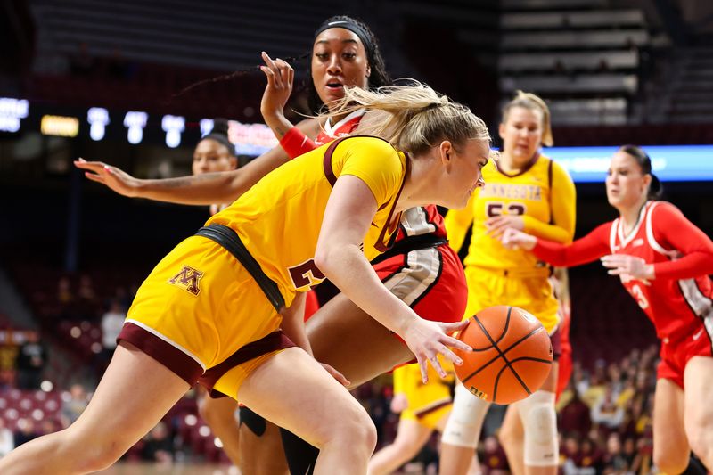 Feb 8, 2024; Minneapolis, Minnesota, USA; Minnesota Golden Gophers forward Mallory Heyer (24) works around Ohio State Buckeyes forward Cotie McMahon (32) during the first half at Williams Arena. Mandatory Credit: Matt Krohn-USA TODAY Sports