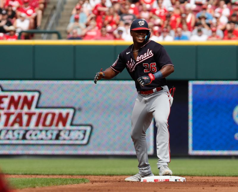 Aug 5, 2023; Cincinnati, Ohio, USA; Washington Nationals left fielder Stone Garrett (36) reacts at second base after hitting an RBI double against the Cincinnati Reds during the first inning at Great American Ball Park. Mandatory Credit: David Kohl-USA TODAY Sports