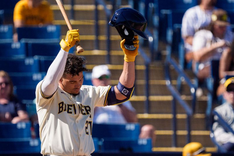 Mar 1, 2024; Phoenix, Arizona, USA;  Milwaukee Brewers infielder Willy Adames (27) reacts between pitches in the fourth during a spring training game against the San Diego Padres at American Family Fields of Phoenix. Mandatory Credit: Allan Henry-USA TODAY Sports