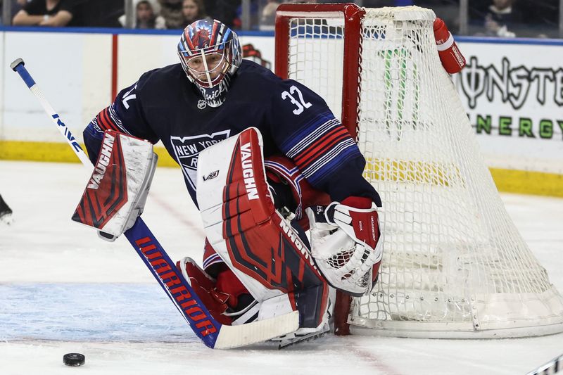 Dec 14, 2024; New York, New York, USA;  New York Rangers goaltender Jonathan Quick (32) defends the net in the third period against the Los Angeles Kings at Madison Square Garden. Mandatory Credit: Wendell Cruz-Imagn Images