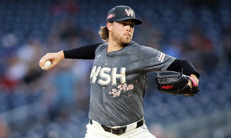 Aug 30, 2024; Washington, District of Columbia, USA; Washington Nationals starting pitcher Jake Irvin (27) pitches during the first inning against the Chicago Cubs at Nationals Park. Mandatory Credit: Daniel Kucin Jr.-USA TODAY Sports


