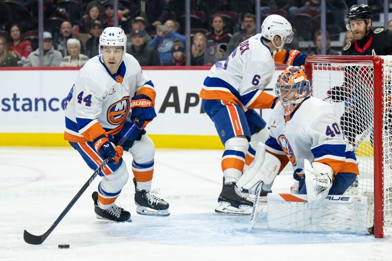 Nov 7, 2024; Ottawa, Ontario, CAN; New York Islanders centre Jean-Gabriel Pageau (44) controls the puck in the first period against the Ottawa Senators at the Canadian Tire Centre. Mandatory Credit: Marc DesRosiers-Imagn Images