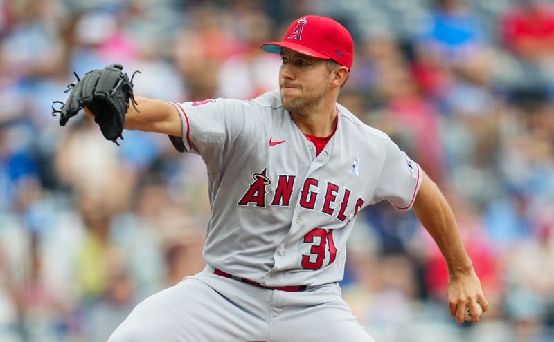 Jun 18, 2023; Kansas City, Missouri, USA; Los Angeles Angels starting pitcher Tyler Anderson (31) pitches during the first inning against the Kansas City Royals at Kauffman Stadium. Mandatory Credit: Jay Biggerstaff-USA TODAY Sports