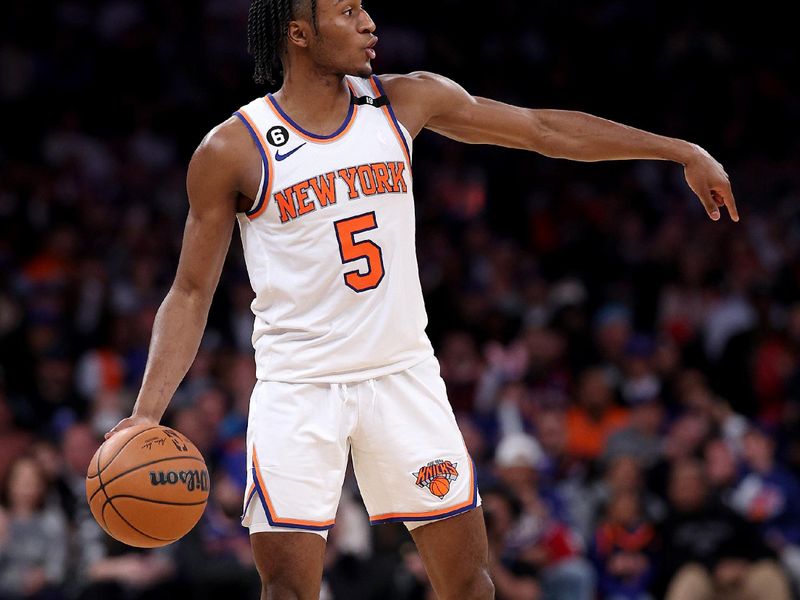 NEW YORK, NEW YORK - APRIL 09:  Immanuel Quickley #5 of the New York Knicks directs the offense in the second half against the Indiana Pacers at Madison Square Garden on April 09, 2023 in New York City. NOTE TO USER: User expressly acknowledges and agrees that, by downloading and or using this photograph, User is consenting to the terms and conditions of the Getty Images License Agreement. (Photo by Elsa/Getty Images)