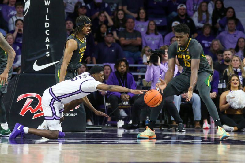 Jan 16, 2024; Manhattan, Kansas, USA; Kansas State Wildcats guard Tylor Perry (2) and Baylor Bears forward Josh Ojinwuna (15) go after a loose ball during overtime at Bramlage Coliseum. Mandatory Credit: Scott Sewell-USA TODAY Sports