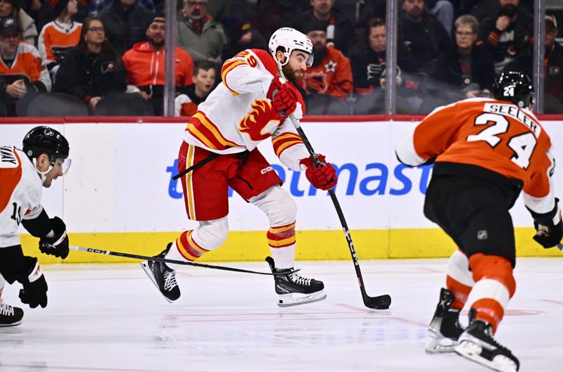 Jan 6, 2024; Philadelphia, Pennsylvania, USA; Calgary Flames center Dillon Dube (29) shoots the puck against the Philadelphia Flyers in the first period at Wells Fargo Center. Mandatory Credit: Kyle Ross-USA TODAY Sports