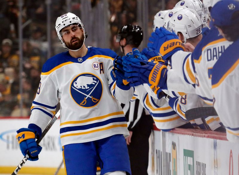 Jan 6, 2024; Pittsburgh, Pennsylvania, USA;  Buffalo Sabres right wing Alex Tuch (89) celebrates with the Sabres bench after scoring a goal against the Pittsburgh Penguins during the first period at PPG Paints Arena. Mandatory Credit: Charles LeClaire-USA TODAY Sports