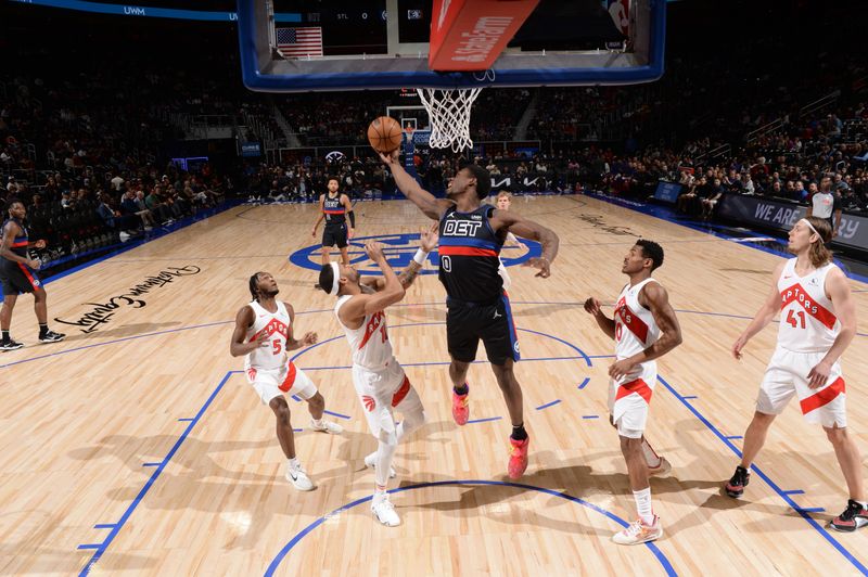 DETROIT, MI - MARCH 13: Jalen Duren #0 of the Detroit Pistons rebounds the ball during the game against the Toronto Raptors on March 13, 2024 at Little Caesars Arena in Detroit, Michigan. NOTE TO USER: User expressly acknowledges and agrees that, by downloading and/or using this photograph, User is consenting to the terms and conditions of the Getty Images License Agreement. Mandatory Copyright Notice: Copyright 2024 NBAE (Photo by Chris Schwegler/NBAE via Getty Images)