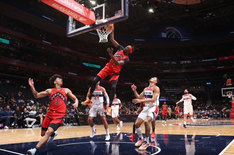 WASHINGTON, DC -? OCTOBER 11: Chris Boucher #25 of the Toronto Raptors dunks the ball during the game against the Washington Wizardsduring a NBA preseason game on October 11, 2024 at Capital One Arena in Washington, DC. NOTE TO USER: User expressly acknowledges and agrees that, by downloading and or using this Photograph, user is consenting to the terms and conditions of the Getty Images License Agreement. Mandatory Copyright Notice: Copyright 2024 NBAE (Photo by Stephen Gosling/NBAE via Getty Images)