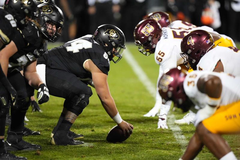 Oct 29, 2022; Boulder, Colorado, USA; Colorado Buffaloes offensive lineman Austin Johnson (64) lines up across from the Arizona State Sun Devils in the third quarter at Folsom Field. Mandatory Credit: Ron Chenoy-USA TODAY Sports