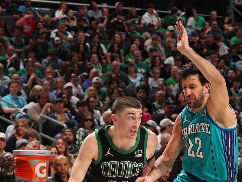 CHARLOTTE, NC - APRIL 1: Payton Pritchard #11 of the Boston Celtics handles the ball during the game against the Charlotte Hornets on April 1, 2024 at Spectrum Center in Charlotte, North Carolina. NOTE TO USER: User expressly acknowledges and agrees that, by downloading and or using this photograph, User is consenting to the terms and conditions of the Getty Images License Agreement. Mandatory Copyright Notice: Copyright 2024 NBAE (Photo by Kent Smith/NBAE via Getty Images)