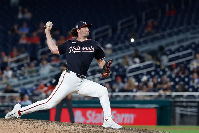 Sep 11, 2024; Washington, District of Columbia, USA; Washington Nationals relief pitcher Kyle Finnegan (67) pitches against the Atlanta Braves during the ninth inning at Nationals Park. Mandatory Credit: Geoff Burke-Imagn Images