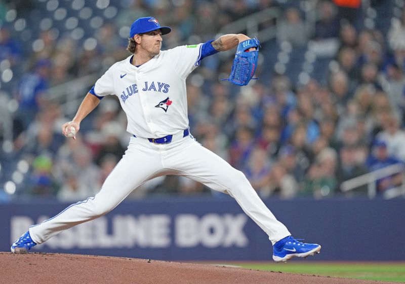 Apr 17, 2024; Toronto, Ontario, CAN; Toronto Blue Jays starting pitcher Kevin Gausman (34) throws a pitch against the New York Yankees during the first inning at Rogers Centre. Mandatory Credit: Nick Turchiaro-USA TODAY Sports