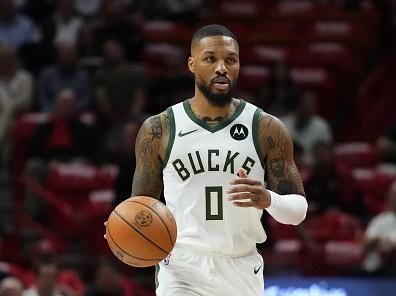 MIAMI, FLORIDA - NOVEMBER 28: Damian Lillard #0 of the Milwaukee Bucks dribbles the ball up the court against the Miami Heat in the first quarter during the NBA In-season Tournament game at Kaseya Center on November 28, 2023 in Miami, Florida. NOTE TO USER: User Expressly acknowledges and agrees that, by downloading and or using this photograh, User is consenting to the terms and conditions of the Getty Images License Agreement. (Photo by Rich Storry/Getty Images)