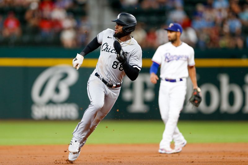 Aug 2, 2023; Arlington, Texas, USA; Chicago White Sox center fielder Luis Robert Jr. (88) rounds second base during the first inning against the Texas Rangers at Globe Life Field. Mandatory Credit: Andrew Dieb-USA TODAY Sports