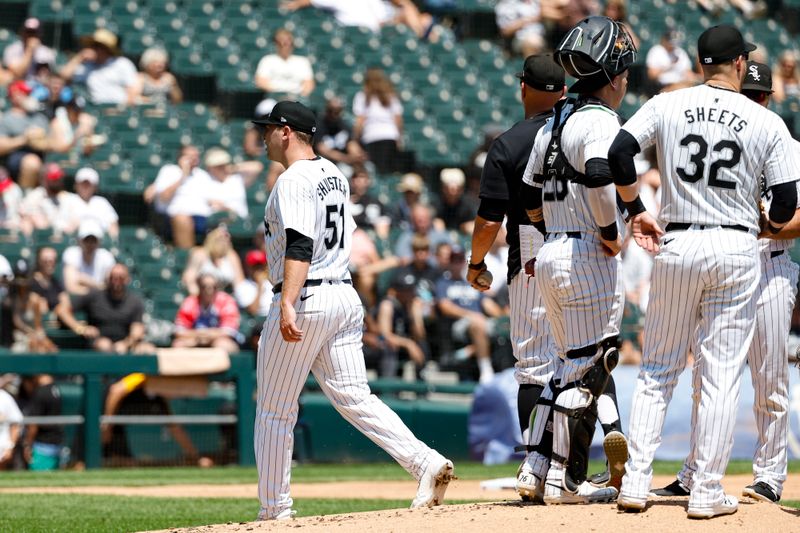 Jul 14, 2024; Chicago, Illinois, USA; Chicago White Sox starting pitcher Jared Shuster (51) leaves a baseball game against the Pittsburgh Pirates in the first inning at Guaranteed Rate Field. Mandatory Credit: Kamil Krzaczynski-USA TODAY Sports