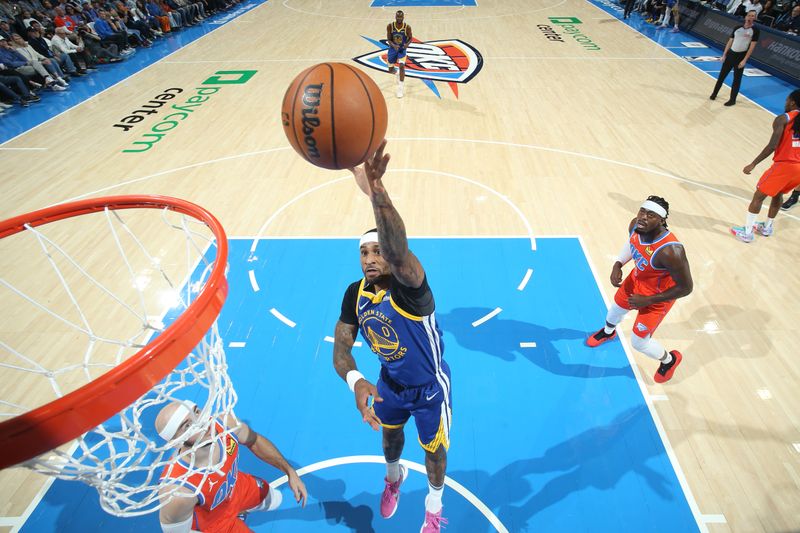 OKLAHOMA CITY, OK - NOVEMBER 10: Gary Payton II #0 of the Golden State Warriors drives to the basket during the game against the Oklahoma City Thunder on November 10, 2024 at Paycom Center in Oklahoma City, Oklahoma. NOTE TO USER: User expressly acknowledges and agrees that, by downloading and or using this photograph, User is consenting to the terms and conditions of the Getty Images License Agreement. Mandatory Copyright Notice: Copyright 2024 NBAE (Photo by Nathaniel S. Butler/NBAE via Getty Images)