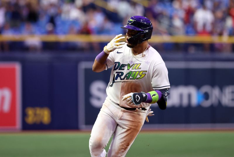 Sep 8, 2023; St. Petersburg, Florida, USA; Tampa Bay Rays third baseman Isaac Paredes (17) celebrates after he hit a home run against the Seattle Mariners during the eighth inning  at Tropicana Field. Mandatory Credit: Kim Klement Neitzel-USA TODAY Sports