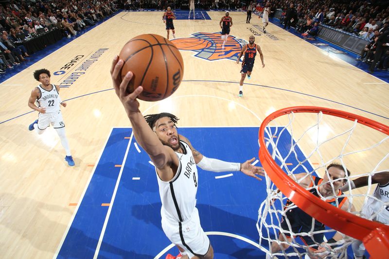 NEW YORK, NY - APRIL 12: Trendon Watford #9 of the Brooklyn Nets drives to the basket during the game against the New York Knicks on April 12, 2024 at Madison Square Garden in New York City, New York.  NOTE TO USER: User expressly acknowledges and agrees that, by downloading and or using this photograph, User is consenting to the terms and conditions of the Getty Images License Agreement. Mandatory Copyright Notice: Copyright 2024 NBAE  (Photo by Nathaniel S. Butler/NBAE via Getty Images)