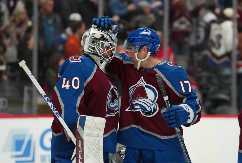 Jan 24, 2023; Denver, Colorado, USA; Colorado Avalanche goaltender Alexandar Georgiev (40) and defenseman Brad Hunt (17) celebrate defeating the Washington Capitals in the third period at Ball Arena. Mandatory Credit: Ron Chenoy-USA TODAY Sports