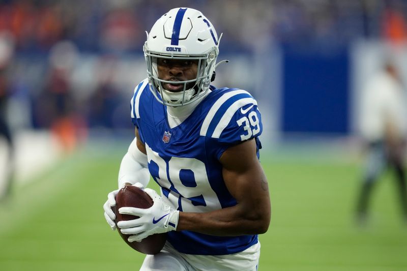 Indianapolis Colts cornerback Darrell Baker Jr. (39) warms up before playing against the Denver Broncos in a preseason NFL football game, Sunday, Aug. 11, 2024, in Westfield, Ind. (AP Photo/Darron Cummings)