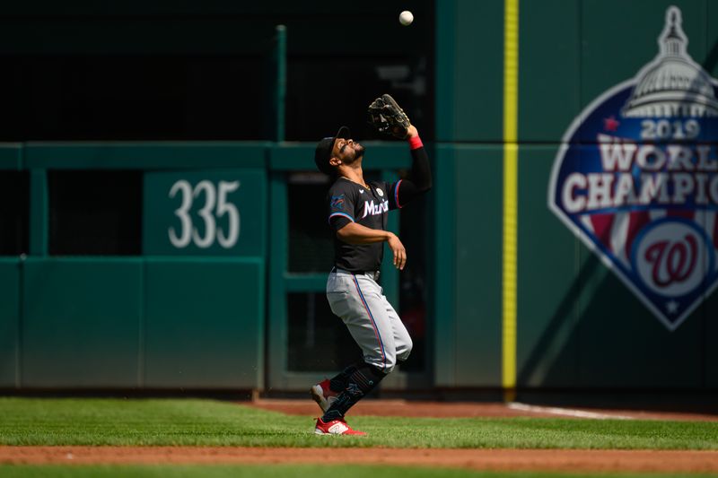 Sep 15, 2024; Washington, District of Columbia, USA; Miami Marlins second baseman Otto Lopez (61) catches a pop up in the infield against the Washington Nationals during the first inning at Nationals Park. Mandatory Credit: Rafael Suanes-Imagn Images