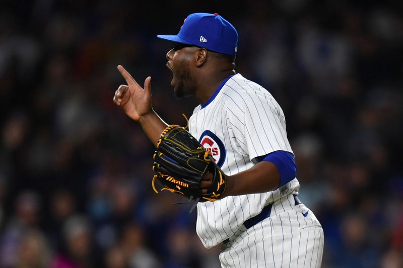 Apr 20, 2024; Chicago, Illinois, USA; Chicago Cubs pitcher Hector Neris (51) reacts after defeating the Miami Marlins at Wrigley Field. Mandatory Credit: Patrick Gorski-USA TODAY Sports