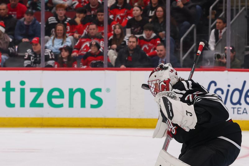 Jan 14, 2026; Newark, New Jersey, USA; New Jersey Devils goaltender Jacob Markstrom (25) makes a save against the Seattle Kraken during the first period at Prudential Center. Mandatory Credit: Ed Mulholland-Imagn Images