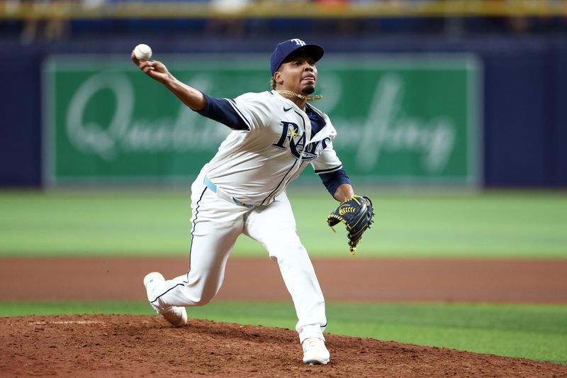 Sep 19, 2024; St. Petersburg, Florida, USA; Tampa Bay Rays pitcher Edwin Uceta (63) throws a pitch against the Boston Red Sox in the eighth inning at Tropicana Field. Mandatory Credit: Nathan Ray Seebeck-Imagn Images