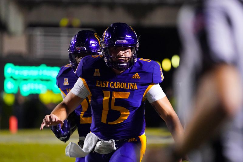 Sep 10, 2022; Greenville, North Carolina, USA;  East Carolina Pirates quarterback Alex Flinn (15) comes out to block on the play against the Old Dominion Monarchs during the second half at Dowdy-Ficklen Stadium. Mandatory Credit: James Guillory-USA TODAY Sports