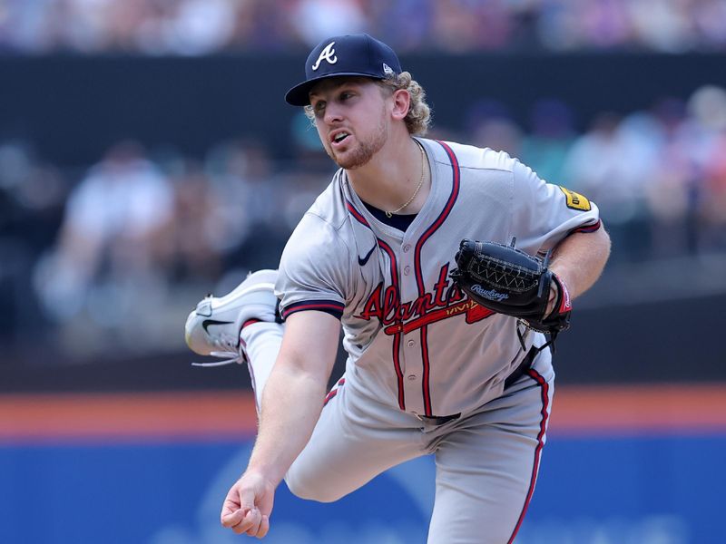 Jul 27, 2024; New York City, New York, USA; Atlanta Braves starting pitcher Spencer Schwellenbach (56) follows through on a pitch against the New York Mets during the first inning at Citi Field. Mandatory Credit: Brad Penner-USA TODAY Sports