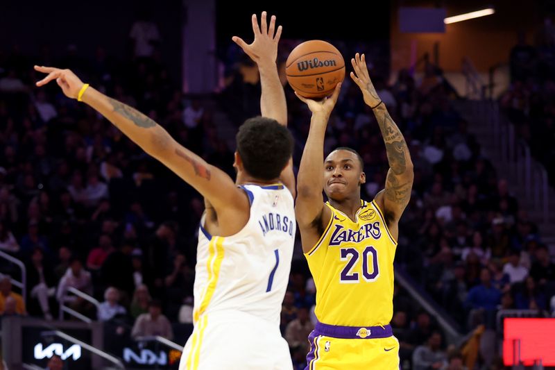 SAN FRANCISCO, CALIFORNIA - OCTOBER 18: Maxwell Lewis #20 of the Los Angeles Lakers shoots over Kyle Anderson #1 of the Golden State Warriors during the first half of their preseason game at Chase Center on October 18, 2024 in San Francisco, California.  NOTE TO USER: User expressly acknowledges and agrees that, by downloading and/or using this photograph, user is consenting to the terms and conditions of the Getty Images License Agreement.  (Photo by Ezra Shaw/Getty Images)