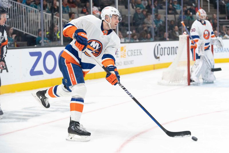 Mar 7, 2024; San Jose, California, USA; New York Islanders defenseman Adam Pelech (3) passes the puck during the second period against the San Jose Sharks at SAP Center at San Jose. Mandatory Credit: Stan Szeto-USA TODAY Sports