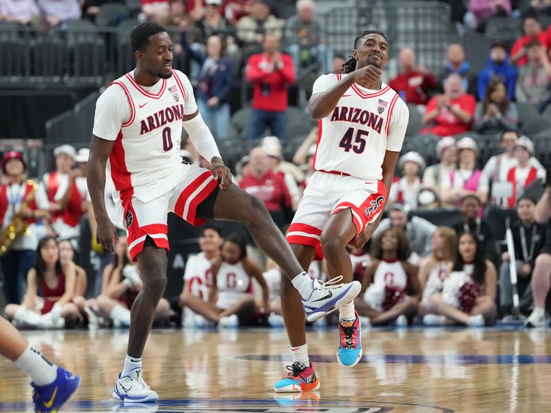 Mar 9, 2023; Las Vegas, NV, USA; Arizona Wildcats guard Courtney Ramey (0) and Arizona Wildcats guard Cedric Henderson Jr. (45) celebrate after a scoring play against the Stanford Cardinal during the first half at T-Mobile Arena. Mandatory Credit: Stephen R. Sylvanie-USA TODAY Sports