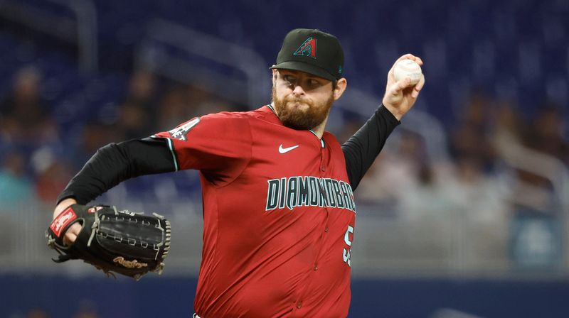 Aug 21, 2024; Miami, Florida, USA;  Arizona Diamondbacks starting pitcher Jordan Montgomery (52) pitches against the Miami Marlins in the second inning at loanDepot Park. Mandatory Credit: Rhona Wise-USA TODAY Sports