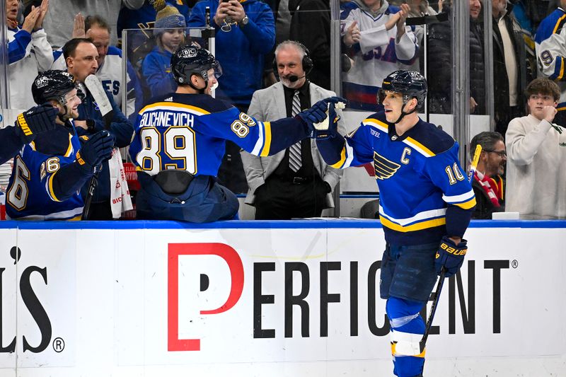 Jan 9, 2024; St. Louis, Missouri, USA;  St. Louis Blues center Brayden Schenn (10) celebrates with left wing Pavel Buchnevich (89) after scoring against the Florida Panthers during the first period at Enterprise Center. Mandatory Credit: Jeff Curry-USA TODAY Sports