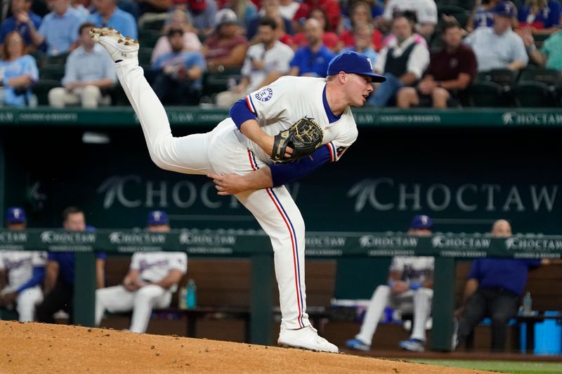 Sep 19, 2024; Arlington, Texas, USA; Texas Rangers pitcher Walter Pennington (52) follows through on a pitch during the fourth inning against the Toronto Blue Jays at Globe Life Field. Mandatory Credit: Raymond Carlin III-Imagn Images