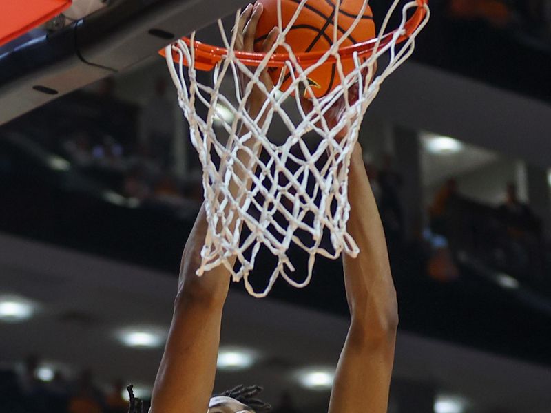 Feb 24, 2024; Knoxville, Tennessee, USA; Tennessee Volunteers forward Jonas Aidoo (0) dunks the ball against the Texas A&M Aggies during the second half at Thompson-Boling Arena at Food City Center. Mandatory Credit: Randy Sartin-USA TODAY Sports