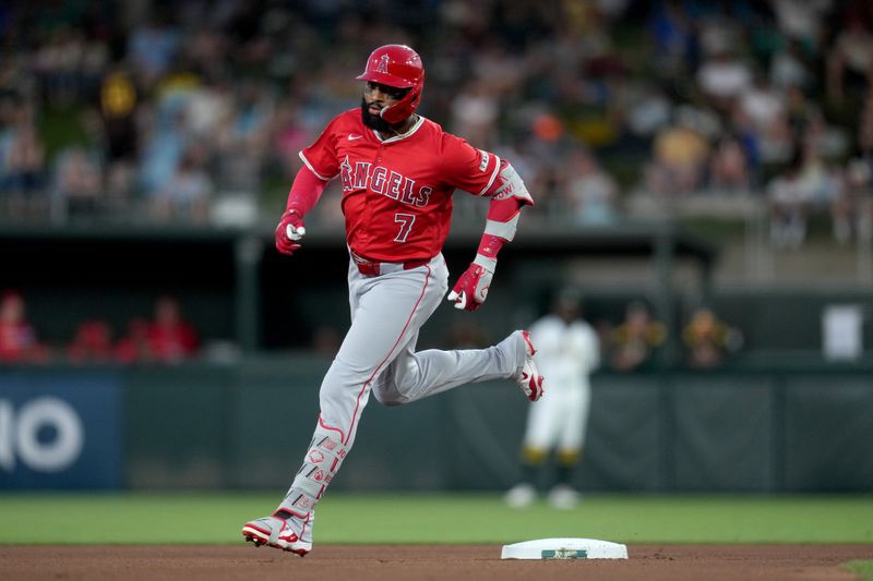 May 21, 2025; West Sacramento, California, USA; Los Angeles Angels right fielder Jo Adell (7) rounds second base after hitting a home run against the Athletics in the fourth inning at Sutter Health Park. Mandatory Credit: Cary Edmondson-Imagn Images