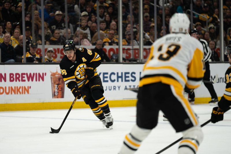 Jan 11, 2026; Boston, Massachusetts, USA; Boston Bruins right-winger David Pastrnak (88) skates with the puck during the first period of the game against the Pittsburgh Penguins at TD Garden. Mandatory Credit: Natalie Reid-Imagn Images