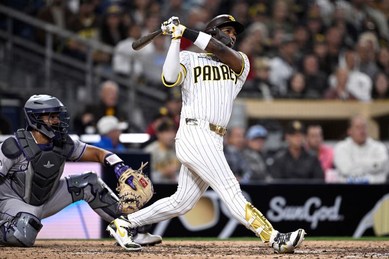 May 13, 2024; San Diego, California, USA; San Diego Padres left fielder Jurickson Profar (10) hits a two-run home run against the Colorado Rockies during the sixth inning at Petco Park. Mandatory Credit: Orlando Ramirez-USA TODAY Sports