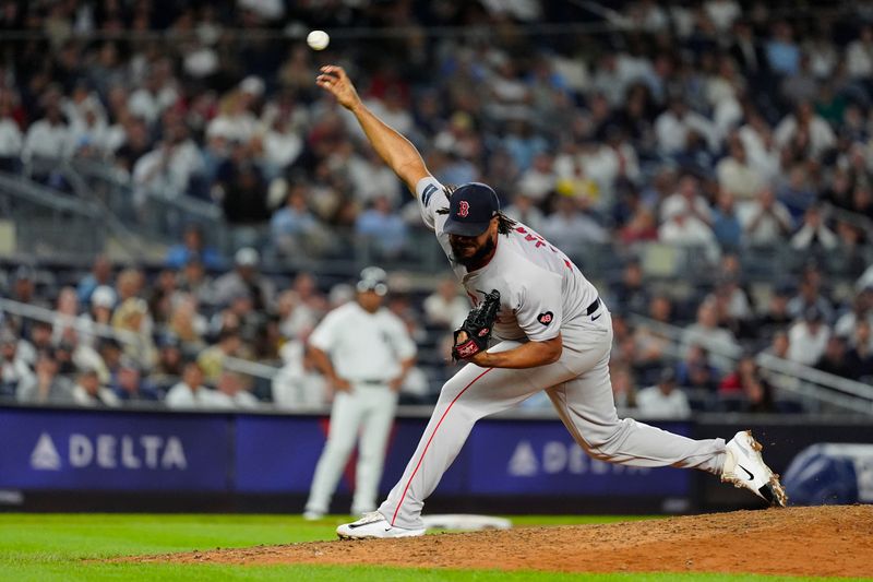 Sep 12, 2024; Bronx, New York, USA; Boston Red Sox pitcher Kenley Jansen (74) delivers a pitch against the New York Yankees during the ninth inning at Yankee Stadium. Mandatory Credit: Gregory Fisher-Imagn Images