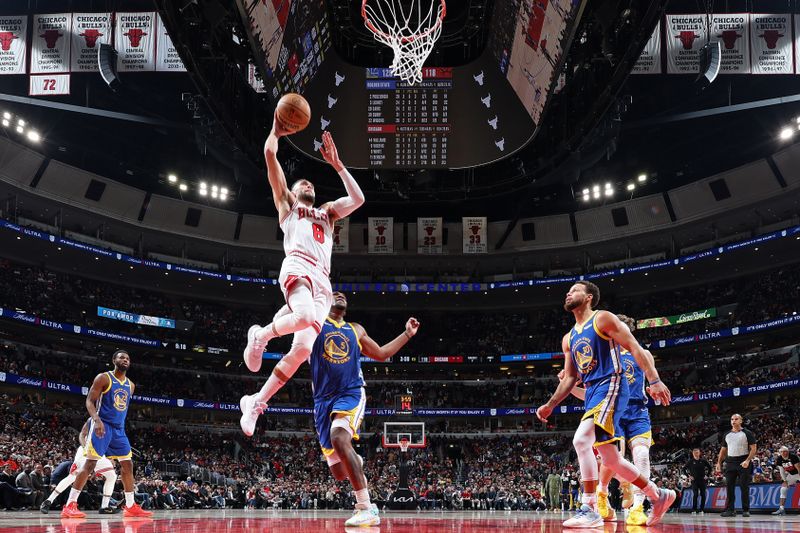 CHICAGO, IL - JANUARY 12: Zach LaVine #8 of the Chicago Bulls dunks the ball during the game against the Golden State Warriors on January 12, 2024 at United Center in Chicago, Illinois. NOTE TO USER: User expressly acknowledges and agrees that, by downloading and or using this photograph, User is consenting to the terms and conditions of the Getty Images License Agreement. Mandatory Copyright Notice: Copyright 2024 NBAE (Photo by Jeff Haynes/NBAE via Getty Images)