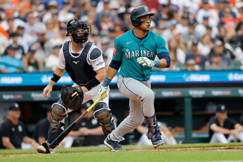 Jul 12, 2025; Detroit, Michigan, USA; Seattle Mariners second baseman Jorge Polanco (7) hits a double in the third inning against the Detroit Tigers at Comerica Park. Mandatory Credit: Rick Osentoski-Imagn Images