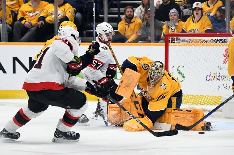 Feb 27, 2024; Nashville, Tennessee, USA; Nashville Predators goaltender Juuse Saros (74) loses the puck after a save on a shot by Ottawa Senators right wing Vladimir Tarasenko (91) during the second period at Bridgestone Arena. Mandatory Credit: Christopher Hanewinckel-USA TODAY Sports