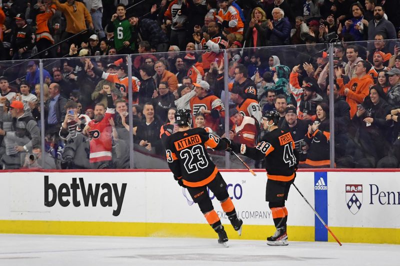 Mar 19, 2024; Philadelphia, Pennsylvania, USA; Philadelphia Flyers center Morgan Frost (48) celebrates his goal with defenseman Ronnie Attard (23) against the Toronto Maple Leafsduring the second period at Wells Fargo Center. Mandatory Credit: Eric Hartline-USA TODAY Sports